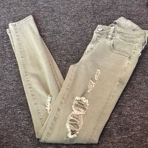Army green American eagle ripped jeans